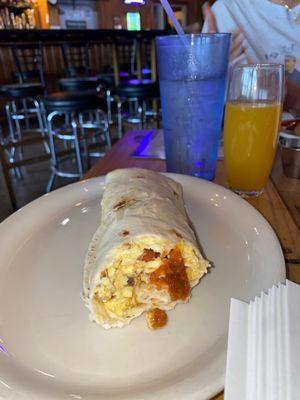 Breakfast burrito & orange juice from brunch menu. Yummy