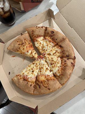 Extra cheese pizza with "normal" crust that takes up half the pizza.