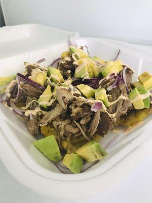 Tostones con lechón.