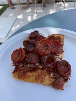 Spicy pepperoni slice.