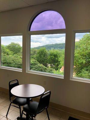 Part of the indoor sitting area.  Beautiful views. Air-conditioned.