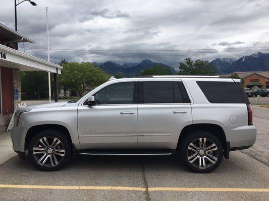 2017 GMC Yukon Denali with 3M Crystalline 50% window film on the Front doors.