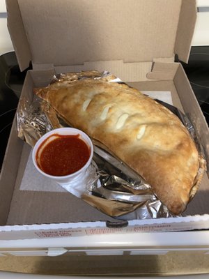 Ham and cheese calzone with red sauce