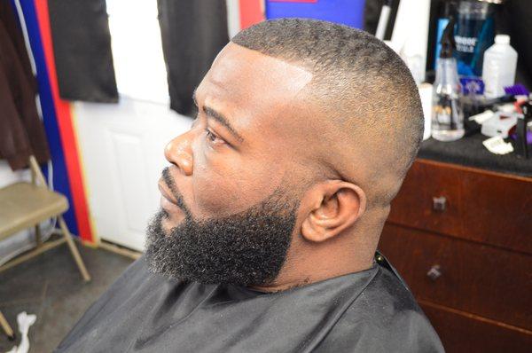 Wave length bald Fade with beard.