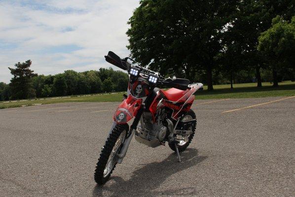 My daughter's dirt bike headlights.