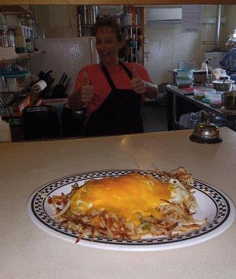 Haystack ( hash browns, onion, peppers, topped with 3 eggs ) add Gravy or Cheese