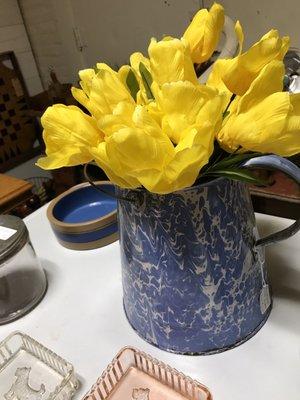 Blue and white enamelware pitcher.