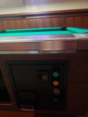 Our pool tables take dollar bills!