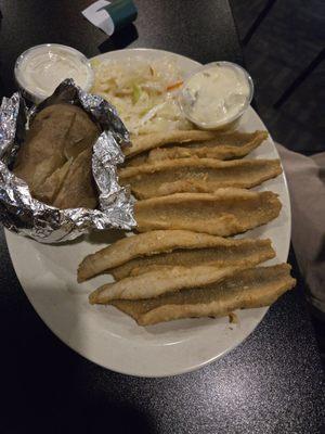 Fish fry meal, comes with coleslaw and potatoes.