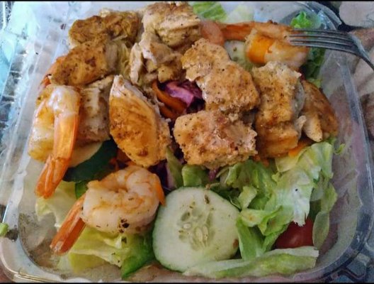 Grilled chicken & shrimp salad. Great size portions of chicken and large shrimp.