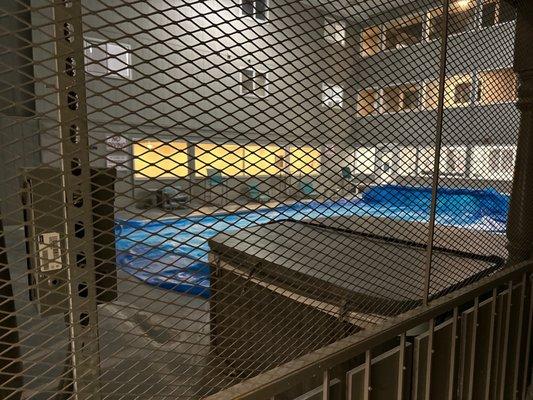 Hot tub next to laundry room.