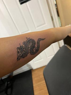 my first professional tattoo, a Chinese dragon from Pinterest, in love with this she's so detail oriented