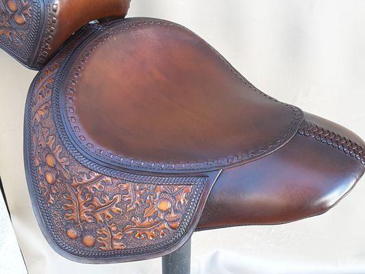 Hand tooled leather Harley seat.