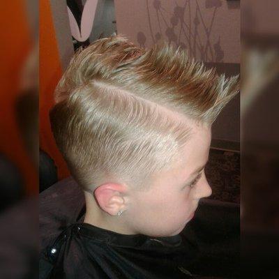 Boy's spikey fade w/ hard part.