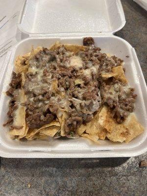 Asada Nachos. They dont add toppings anymore.