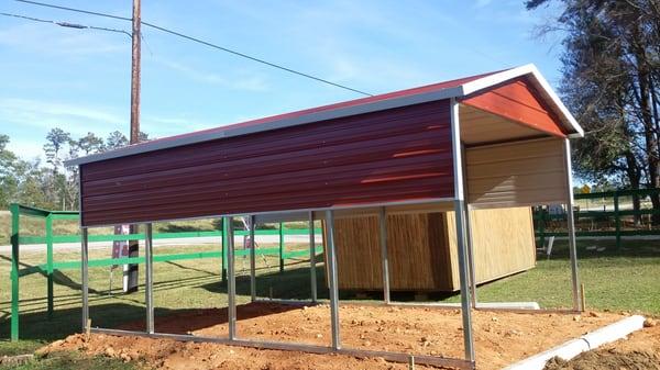 Boxed Eve Carport, 1 of 3 trim levels available.