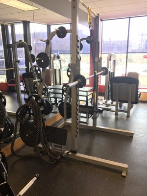 Squat rack, TRX suspension trainer, leg press