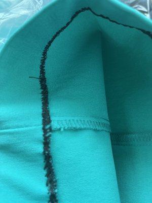 Black thread used on a hem for teal pants!!