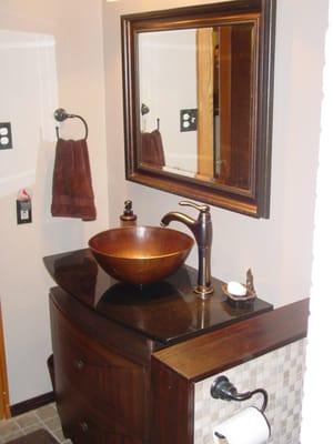 This is a very small bath only 5 ft wide and 8 ft deep, I love the fun vanity and the décor,