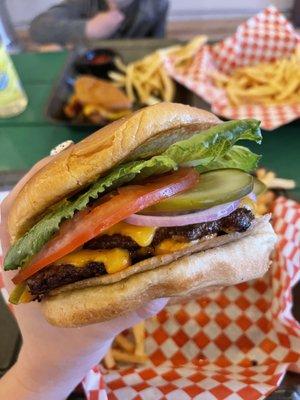 Quarter Pound Wagyu, smashed on the grill topped with cheddar, bacon, lettuce, tomato, pickles, onion, mayo, mustard, or ketchup.