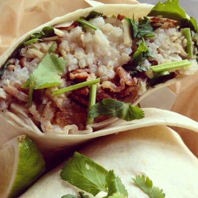 Tilapia wrap w/coconut rice and fried plantains.