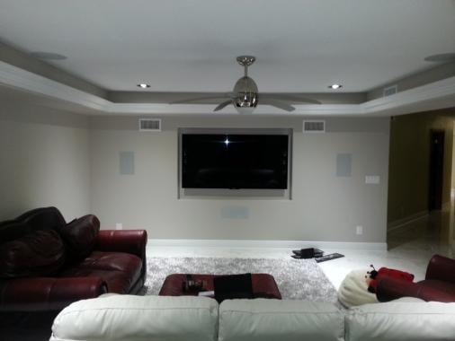 Sony 4k tv and hidden in wall speaker system man cave home theatre.