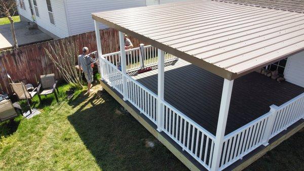 Composite deck and rails with metal roof.