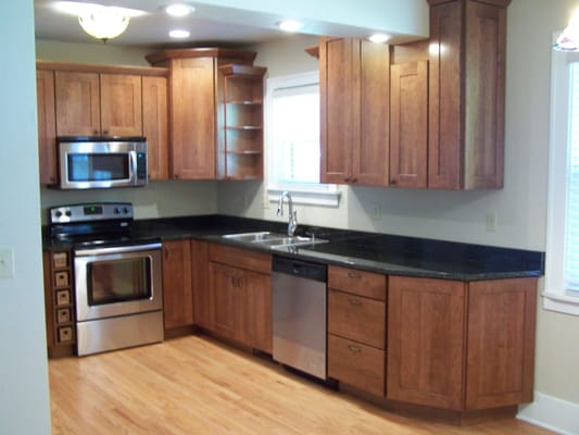 We removed walls, added walls, special cabinets, granite countertops, and refinished the hardwood floors...