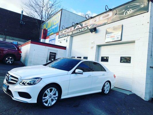 Mercedez E350 with custom painted factory wheels.