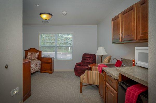 Our Lake Huron Suite. 315 sqft with a private bathroom/shower, closet space, and a kitchenette with a microwave,mini-fridge, and sink.