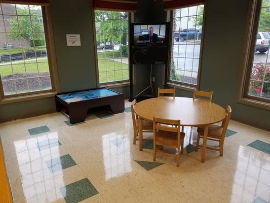 Kids play area. There were toys and books before, but I'm sure they are worried about germs.