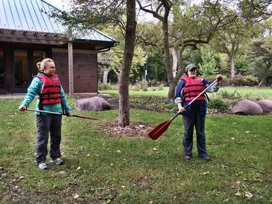 Instructors teaching us paddling strokes.