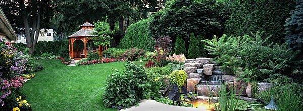 Pergola, landscaping, & water feature