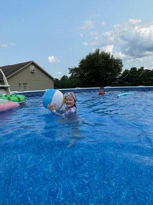 Make A Wish Kid enjoying her new swimming pool!