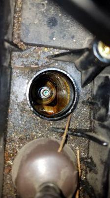 Worn gaskets cause engine oil to leak onto sparkplugs causing damage