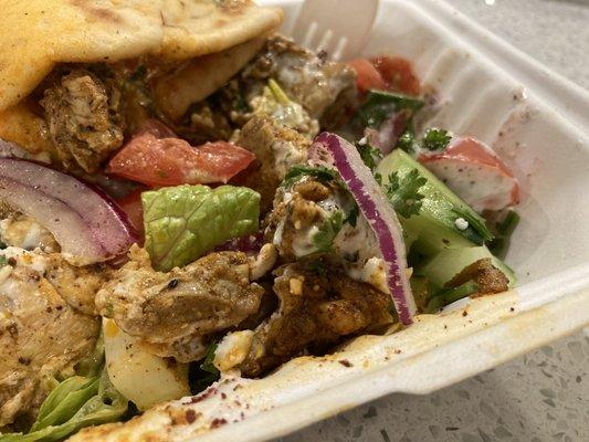 Greek salad with chicken (and leftover pita from a chicken gyro). YUM. The owner wasn't kidding when he said I would enjoy this!