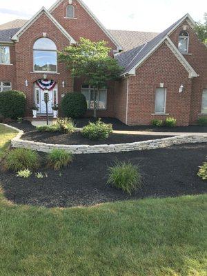 Retaining wall repair and new mulch