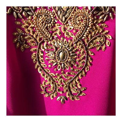 On Wednesdays, we wear pink! Although this looks more like magenta. Our client's beautifully detailed top that we just finished cleaning.