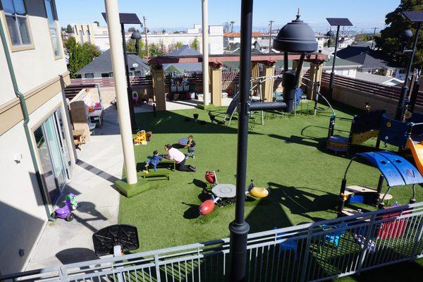 The rooftop playground of the Children's Center is a safe and fun place for kids.