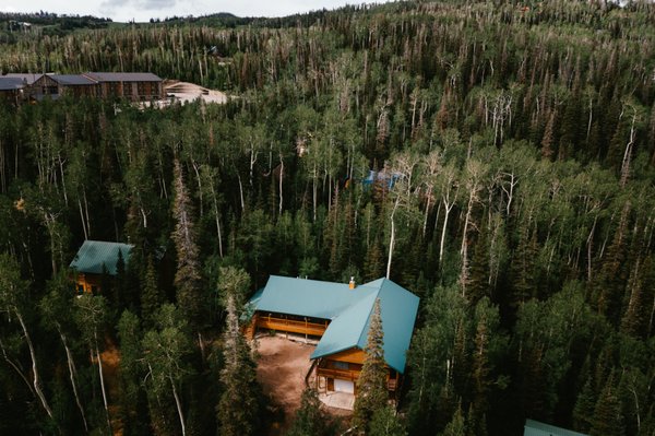 Cabin surrounded by trees in Brian Head, Utah.