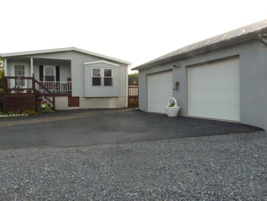 30 x 80 stick built, heated, 5 bay garage!! Home is a 3 bedroom, 2 bath double wide on over an acre lot!...