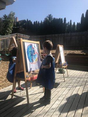 Teachers occasional share photos from school, which I always appreciate. Here they are painting outside on a beautiful day!