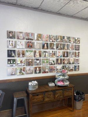 Wall full of wedding cakes that they've designed and created!