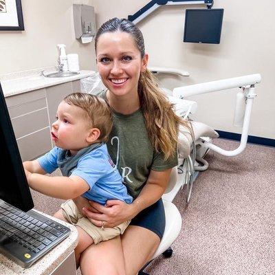 Dr. Littlefield and her son prepare for new patients