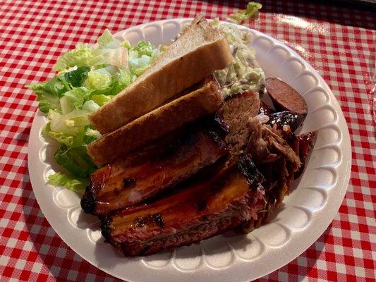 I got the three meat platter, which included two ribs, brisket and sausage. Not a bad meal.