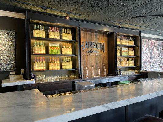 Second level bar inside the Hanson of Sonoma Tasting Room at Hanson Gallery in Sausalito.