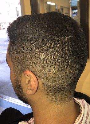 High and tight fade with natural line using a 1/2 cut blade