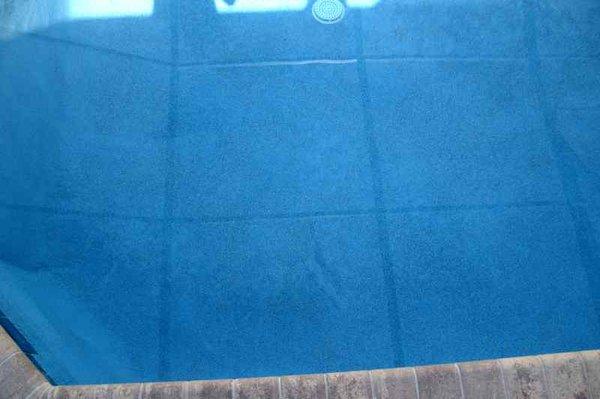 Splotchy finish on bottom of pool.