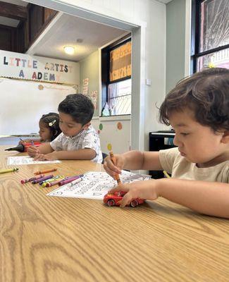 students Practicing to color inside the lines