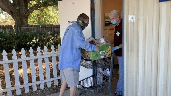 Clients get boxes of fresh groceries for their households!